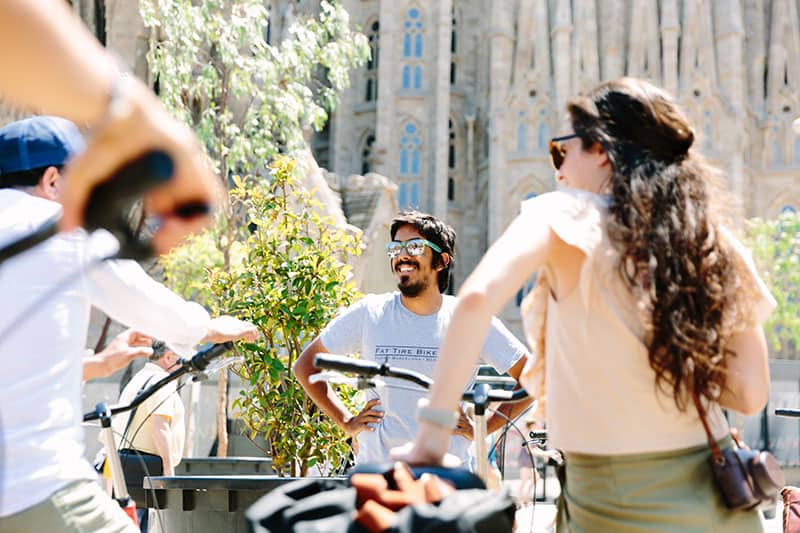 a group of cyclists in Barcelona, Spain