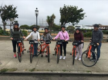 A family poses with their bikes in San Francisco, California