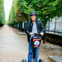 A person on a Segway.