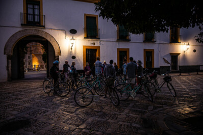 a group learns about the history of seville at night