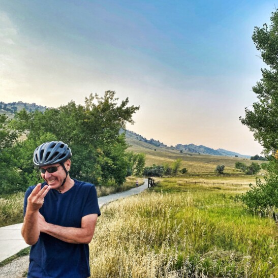 A man enjoying his bike ride in Boulder, Colorado
