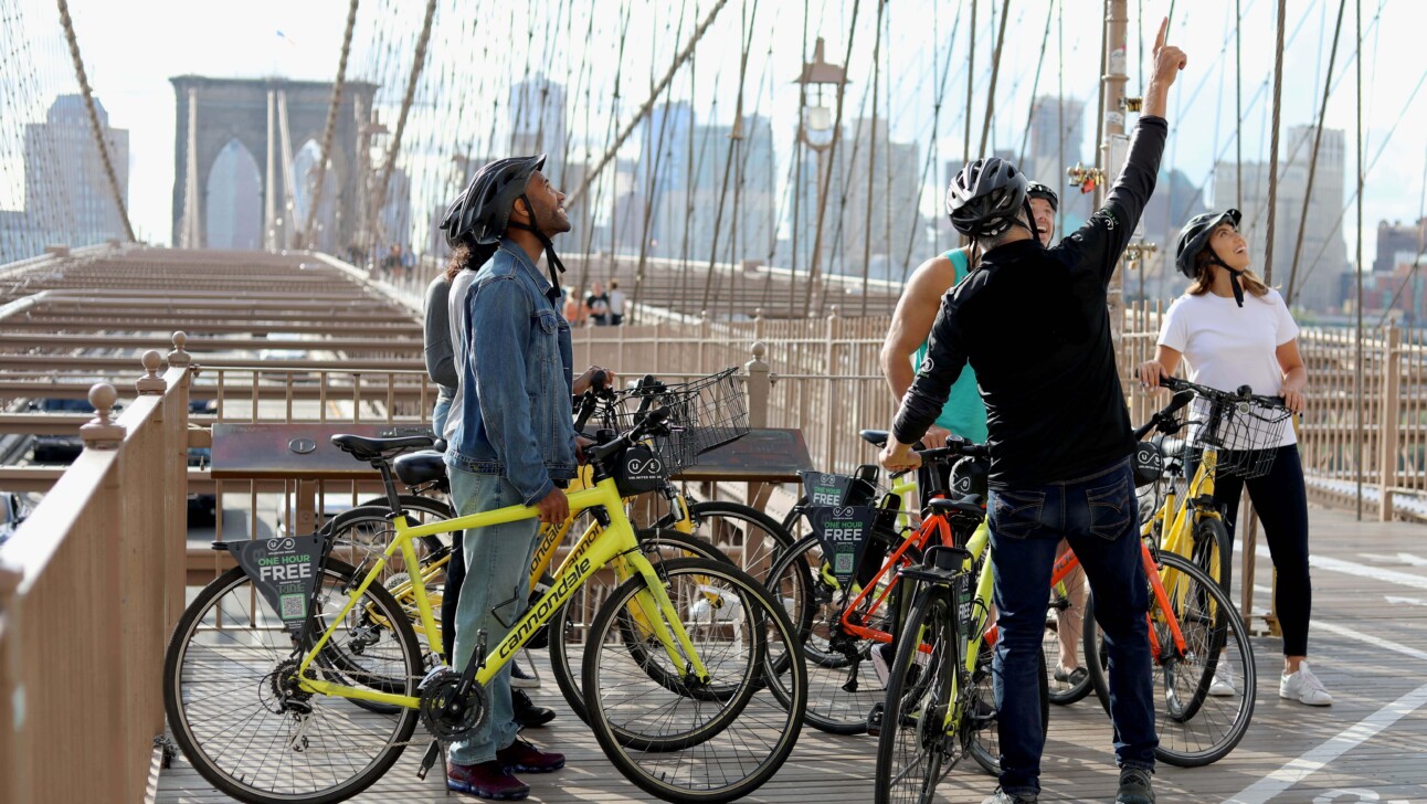 Cyclists cross the Brooklyn Bridge