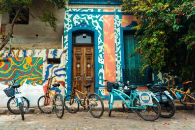 Bikes parked in front of a colorful apartment building in Buenos Aires, Argentina