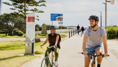 Riding along the boardwalk in Newcastle, Australia