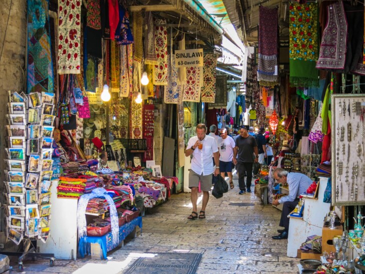 People walking through a market in Jerusalem