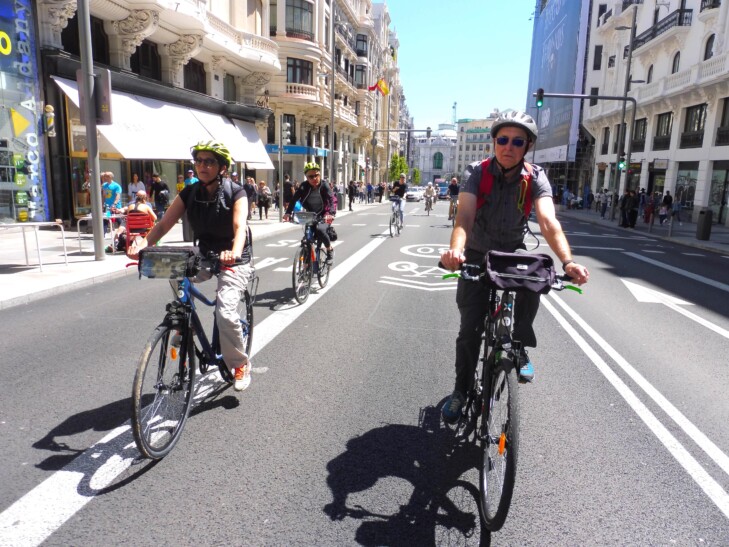 Cyclists ride through Madrid, Spain