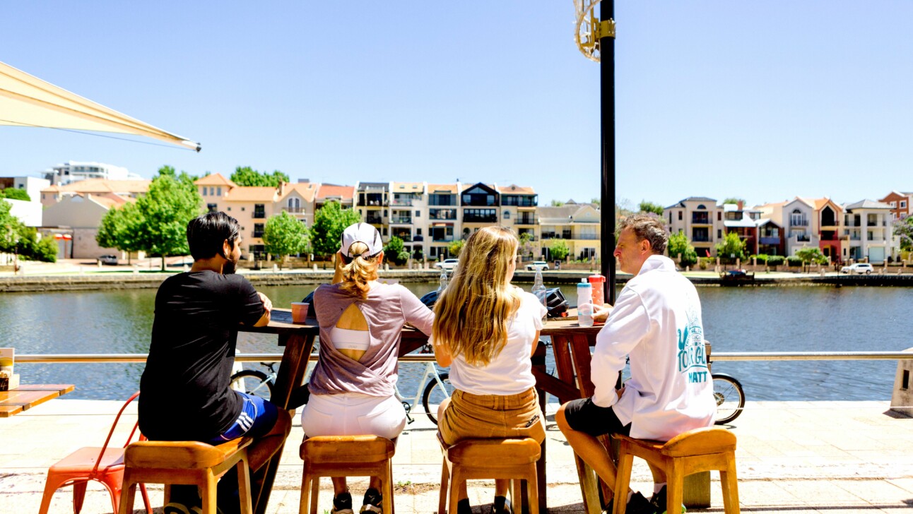 A group of friends enjoying a break at Claisebrook Cove in Perth, Australia