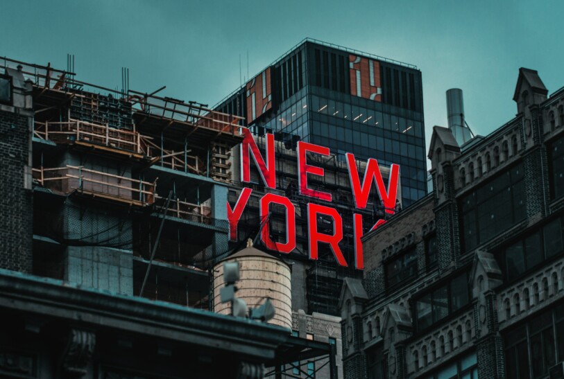 A neon sign reading 'New York' in New York City