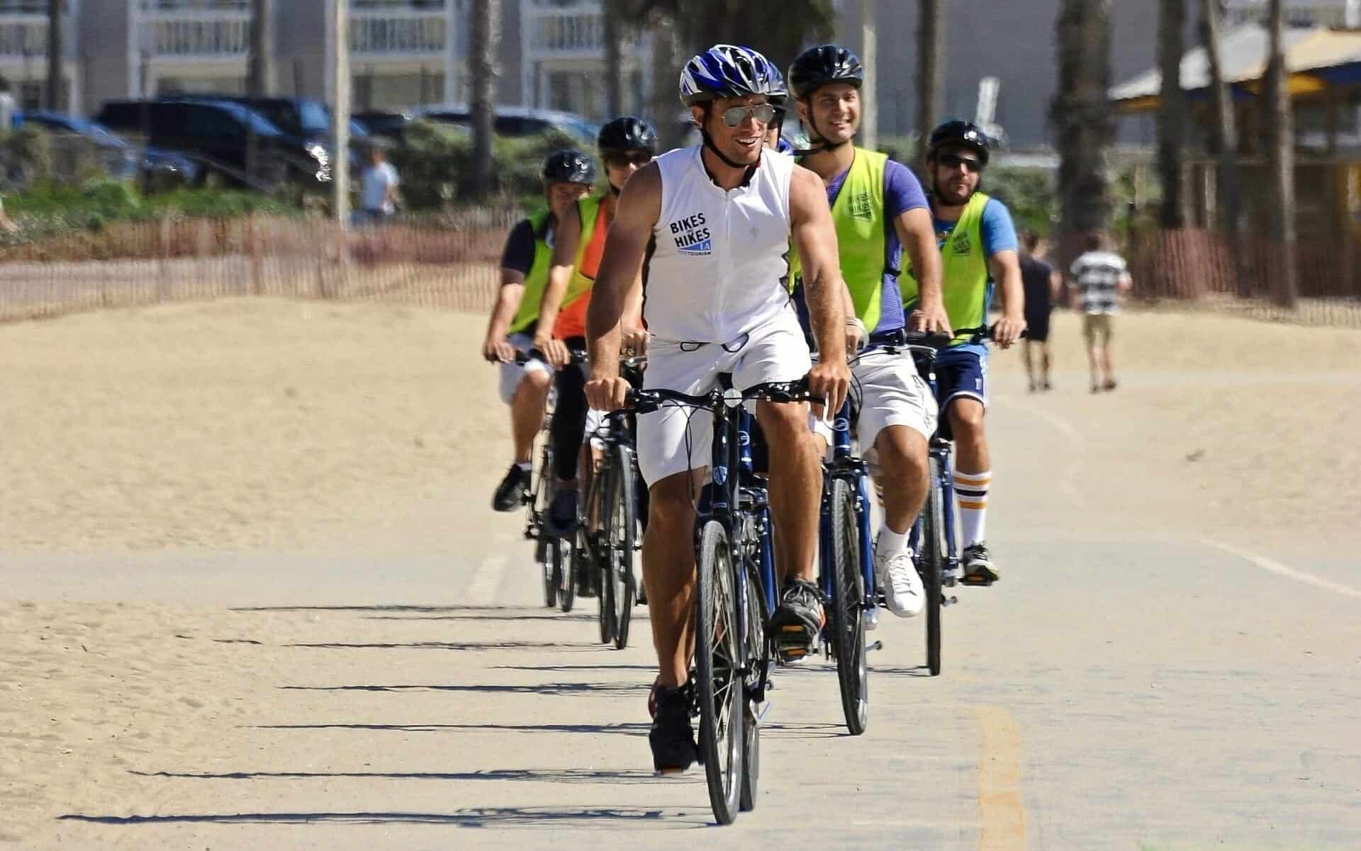 Riders cycle along Venice Beach in Los Angeles, California