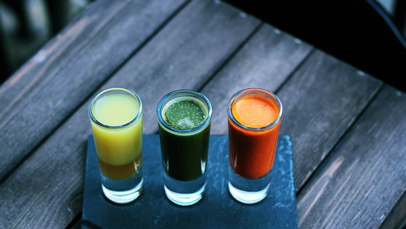 Yellow, green, and orange fresh juice