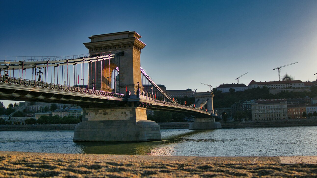 Szechenyi Lanchid Bridge over the Danube River in Budapest, Hungary.